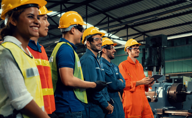 Skillful worker attending brief meeting in the factory .